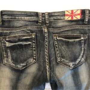 Distressed acid wash jeans